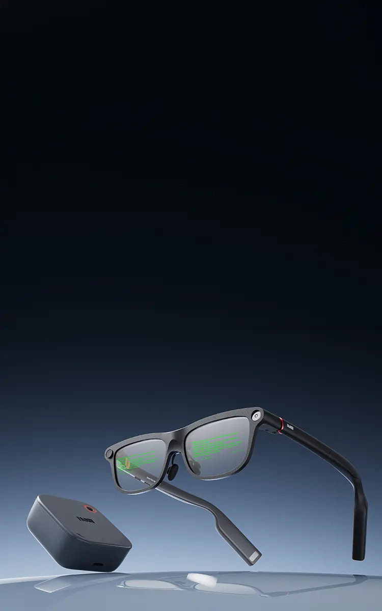 Sunglasses with a small device on a gradient blue background